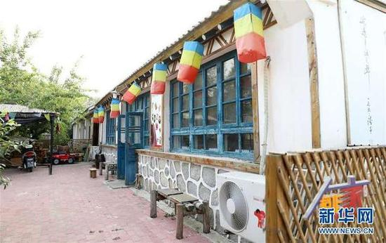 这是盘锦市大洼区荣兴村稻作人家民俗村里的民宿餐厅（7月16日摄）。新华社记者 姚剑锋 摄