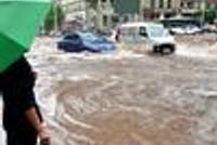 城市让“雨水”无家可归 可不就得“看海”
