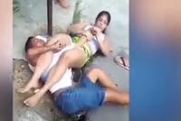 打劫美女不料对方是柔术高手 劫匪被“剪刀腿”压制