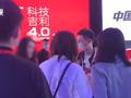 女子大闹北京车展被壮汉裹黑布抬走 回应:礼仪情绪失常