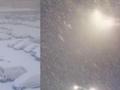 山西晋城大雪如鹅毛飘扬而至 交警街头冒雪帮市民推车