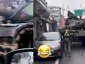 台军方坦克街头演练撞到路边轿车 车主懵了 网友吐槽:技术太烂!