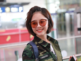 组图：谭松韵迷彩装扮酷现身 梳冲天辫暴露少女心