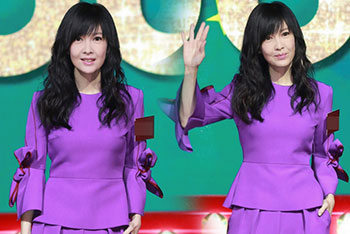 51岁周慧敏腰身纤细