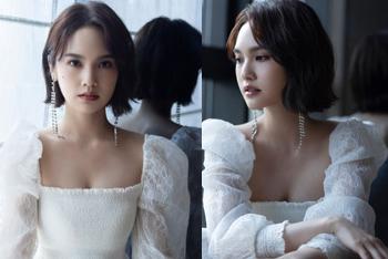 杨丞琳洁白纱裙身材好