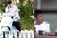 李亚鹏骑电动摩托车会友 佩戴头盔背包装备齐全