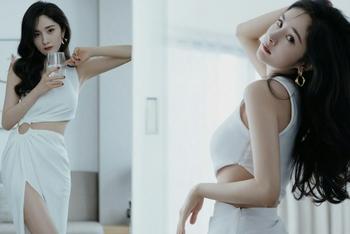 杨幂高开叉长裙秀腰线