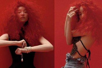 倪妮红发露背装性感