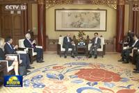 韩正会见美国前财长保尔森