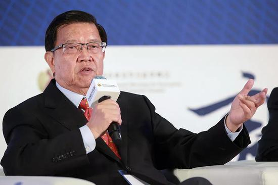 （作为中国加入世界贸易组织谈判的首席代表，龙永图对目前中美之间的“贸易战”表达出一种冷静的认识。图/视觉中国）