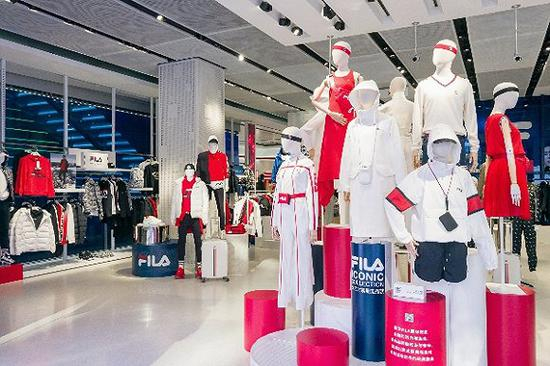 FILA等品牌为安踏集团高端化“输血”。图片来源：视觉中国