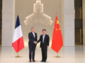 中国人民银行行长潘功胜会见法国总统外事顾问博纳