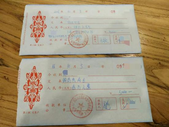 　一位业主45万元溢价款收据 向军 ⁄ 摄