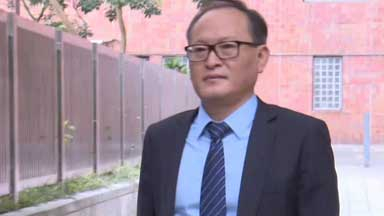 司荣彬13日下午到沙田裁判法院应讯