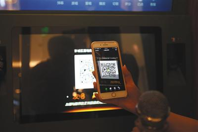 5月31日，崇文门国瑞城负一层，迷你KTV，扫码之后可选择唱歌时长。