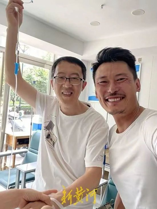 党文杰（左）和李俊（右）第一次见面。本文图片由受访者提供