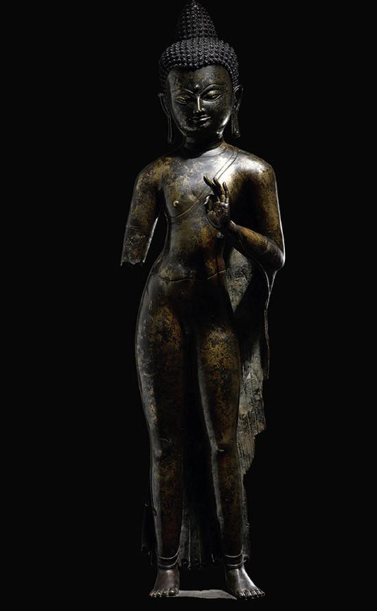 西藏11-12世纪 合金铜释迦牟尼佛站像 中国嘉德2017