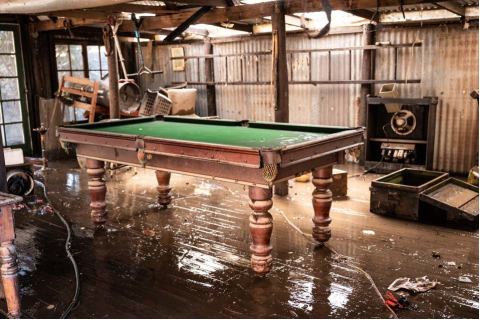 2021年3月26日在澳大利亚悉尼拍摄的被洪水侵袭的房屋，图片来源：新华社