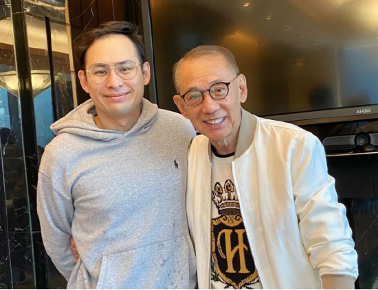 （杨政龙及其父亲杨受成 图片来源：受访者提供）