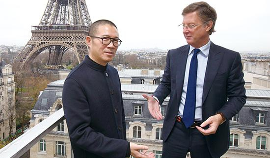 中国华住酒店集团创始人兼董事长季琦和法国雅高酒店集团CEOSebastien Bazin CFP 供图