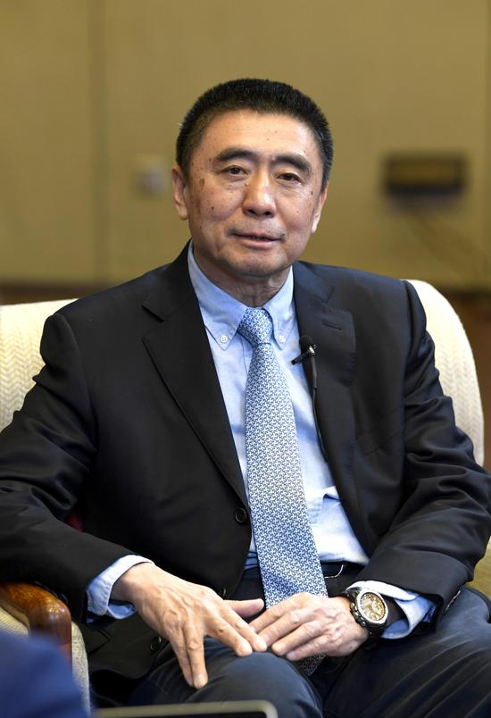 图为中国保利集团公司党委书记、董事长徐念沙。