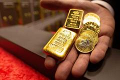 周二黄金期货价格收高1% 创一周来最高收盘价