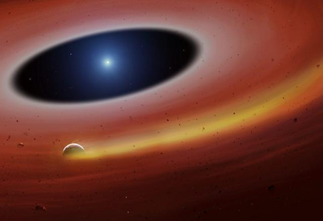 一颗重金属行星碎片绕着白矮星运行,为太阳系的未来提供了想象图