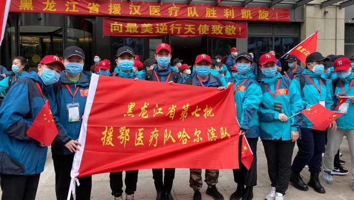（图为参加援鄂医疗队的哈尔滨市民兵胜利凯旋。常智科摄）