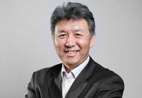 图为东软集团董事长刘积仁