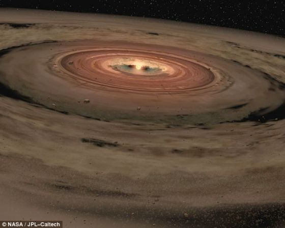 　　一颗棕矮星周围围绕着形成行星的盘状物质。棕矮星质量不足，不能引发核聚变，变成恒星。研究人员说，它们周围可能运行着支持生命生存的岩态外行星。