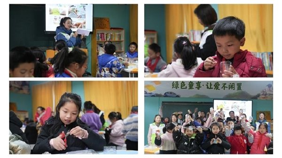 孩子们利用废旧塑料瓶手工艺术品装点环保公益图书馆