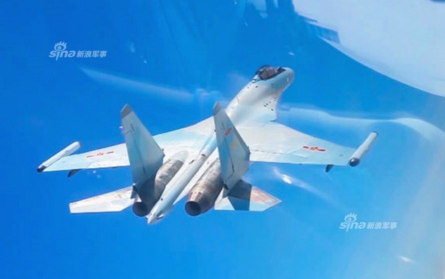 震慑小丑！我国防部公布解放军军机绕台高清图