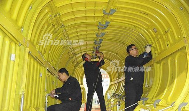 再也不用榔头敲！中国制造运20用上世界顶尖机器人