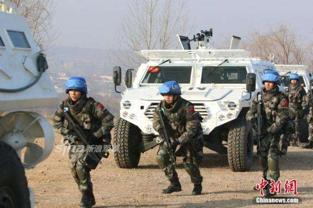 挖掘机技术哪家强？中国南苏丹维和工兵显身手