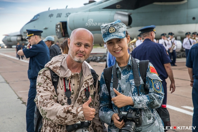 我军参加上合军演部队全数抵俄