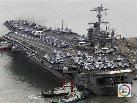 原文配图：美国海军“约翰·斯滕尼斯”号核动力航空母舰。