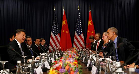 11月19日，国家主席习近平在利马APEC峰会期间会见美国总统奥巴马。