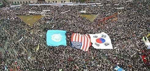 韩国民众苦求美军不要离开