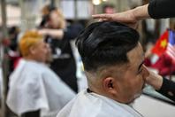 越南理发店搭“特金会”热潮 免费理特朗普和金正恩发型