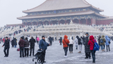 故宫雪后游客不减