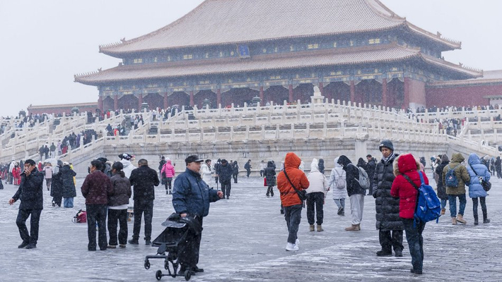 故宫雪后游客不减