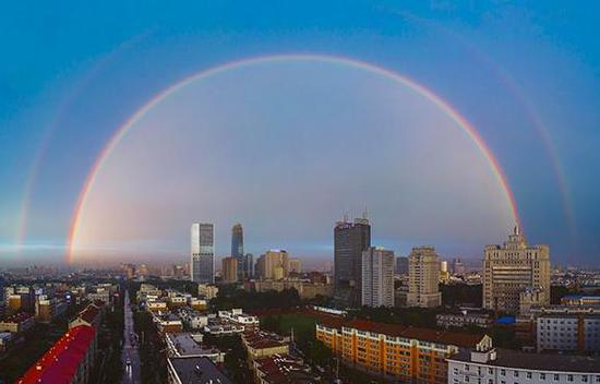 2019年6月11日傍晚，一场强降雨过后，俯瞰吉林省长春市区。新华社记者 许畅 摄