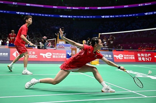 　　中国队混双选手蒋振邦/魏雅欣参加“苏迪曼杯”（图自视觉中国）