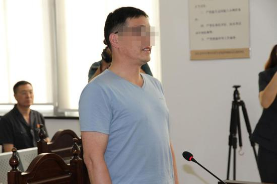 （陆某洲在法庭上 供图：江苏省委政法委）