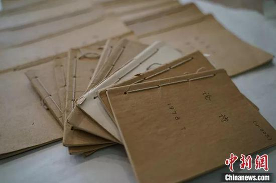  庞中华的笔记本。马嘉伦 摄