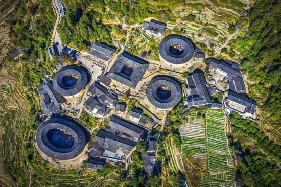 2019年12月3日，航拍福建土楼的标志性景观——南靖田螺坑土楼群。图源：视觉中国