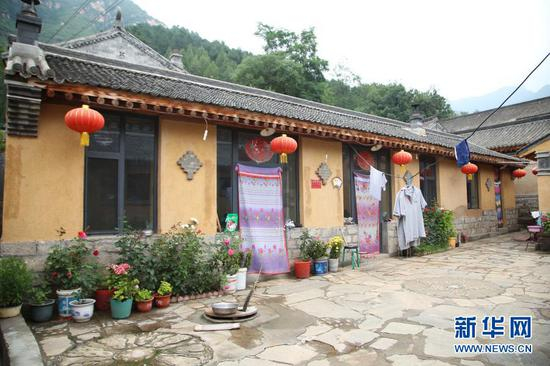 河北省阜平县骆驼湾村村民唐宗秀家的新房（2019年8月7日摄）。新华社记者 赵鸿宇 摄