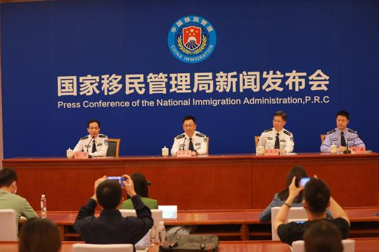 国家移民管理局31日举行的新闻发布会现场（新华社记者任沁沁 摄）