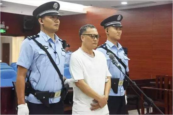 梁振家（图片来自防城港市中级法院）