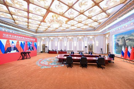 1月21日下午，国家主席习近平在北京人民大会堂同俄罗斯总统普京举行视频会晤。新华社记者 饶爱民 摄